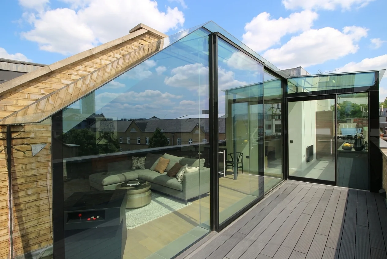 Balcony glass box with sliding glass doors overlooking London