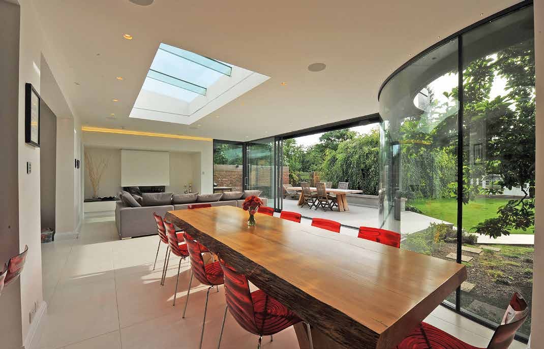 Sliding glass doors connecting a dining room to the garden